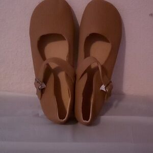 Casual sandals for women and men or young girls. Brown and a sandal.